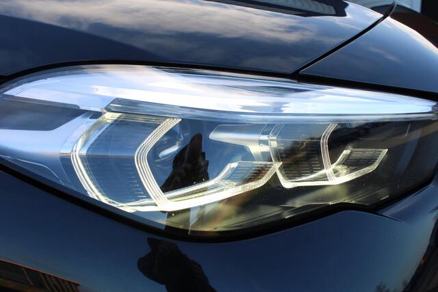 BMW 2-SERIE Gran Coupé 218i Business Edition | Incl. 12 maanden garantie | Cruise control | Climate control | Parkeersensoren | Apple carplay/Android auto | Navigatie | DAB radio | Vol leder sportstoelen |