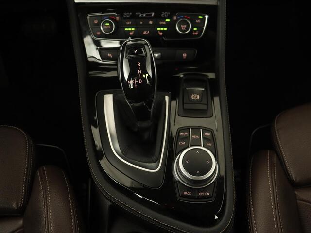 BMW 2-SERIE GRAN TOURER 218i High Executive | Leder | Head-Up | Trekhaak | Stoelverwarming | Navigatie | Full LED | Parkeerhulp | Climate control