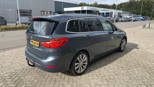 BMW 2-SERIE GRAN TOURER 218i 136pk High Executive Automaat 7P. / Panoramadak / Navigatie / Stoelverwarming / Camera / Trekhaak