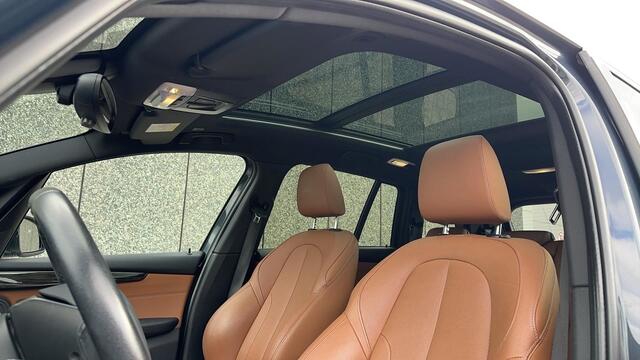 BMW 2-SERIE GRAN TOURER 218i 136pk High Executive Automaat 7P. / Panoramadak / Navigatie / Stoelverwarming / Camera / Trekhaak