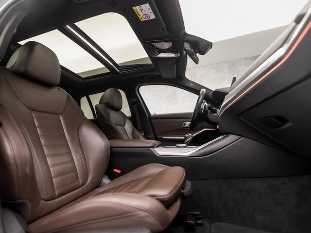 BMW 3-SERIE Touring 318i M Sport Automaat (PANORAMADAK, DEALER ONDERHOUDEN, M PAKKET, APPLE CARPLAY, LASER KOPLAMPEN, LEDEREN SPORTSTOELEN, CAMERA, STOELVERWARMING, GETINT GLAS, ELEK ACHTERKLEP, NIEUWE APK, NIEUWSTAAT)