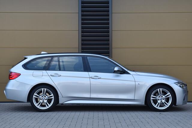 BMW 3-SERIE Touring 320i xDrive Centennial Executive * M Sportpakket * Elektrische trekhaak * Stoelverwarming * Dealer onderhouden *