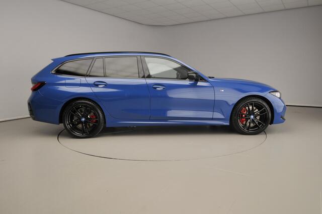 BMW 3-SERIE Touring 330e | Individual Lak | M-Sportpakket | LED | HUD | Trekhaak | Elektr. zetels | DAB | Harman-kardon sound | Alu 19 inch