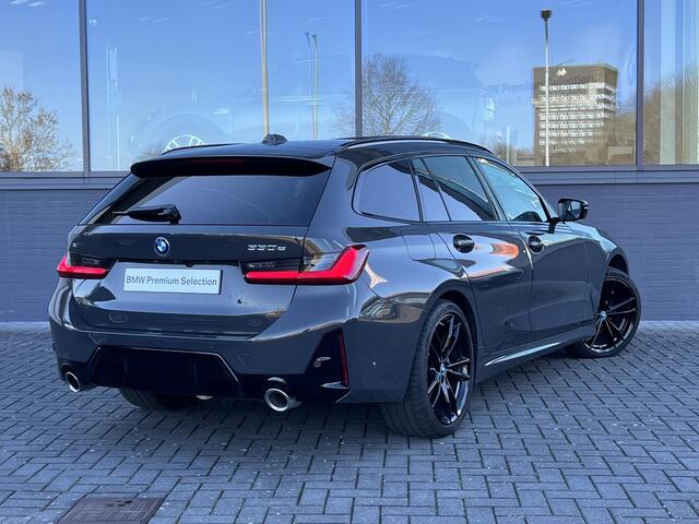 BMW 3-SERIE Touring 330e | M-Sportpakket | Driving Assistant Professional | Panoramadak | Harman/Kardon | Trekhaak