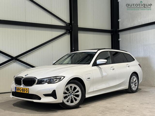 BMW 3-SERIE Touring 320e Business Aut. | panorama | navi | trekhaak |