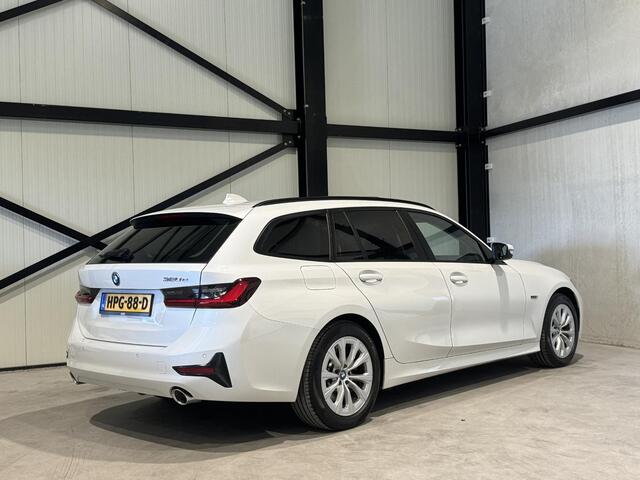 BMW 3-SERIE Touring 320e Business Aut. | panorama | navi | trekhaak |