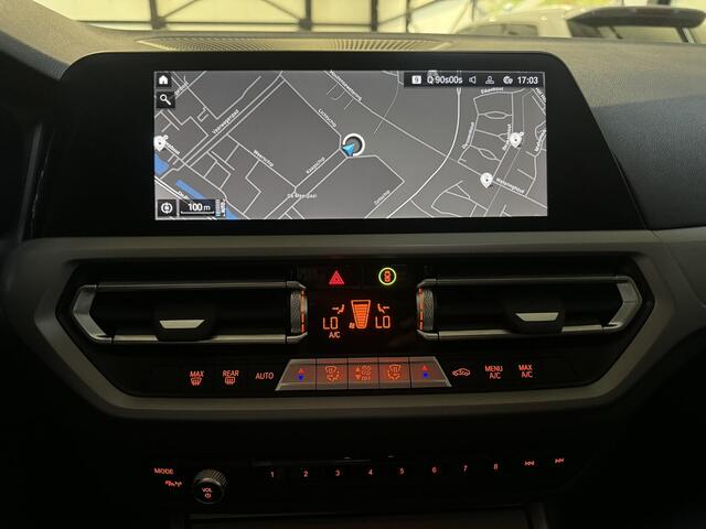 BMW 3-SERIE Touring 320e Business Aut. | panorama | navi | trekhaak |