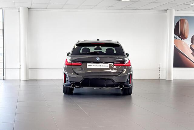 BMW 3-SERIE Touring 330e xDrive | M Sport | Glazen Panoramadak | Stoelverwarming | Headup Display |
