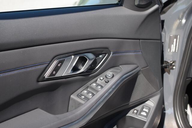 BMW 3-SERIE Touring 330e xDrive 293 PK M-Sport PHEV, Dravit Grau, Trekhaak, Memory, Head-Up
