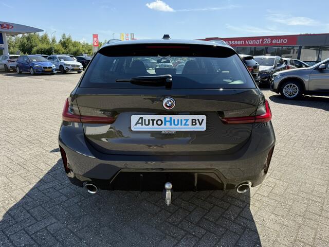 BMW 3-SERIE Touring 330e M Sport Trekhaak 19 Inch Carplay Achteruitrijcamera M Performance Stoelen Head-Up Display Dravit Grau Metallic Keyless Entry