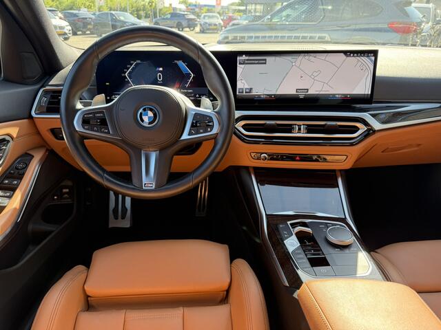 BMW 3-SERIE Touring 330e M Sport Trekhaak 19 Inch Carplay Achteruitrijcamera M Performance Stoelen Head-Up Display Dravit Grau Metallic Keyless Entry