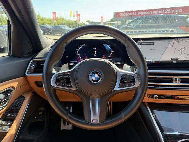 BMW 3-SERIE Touring 330e M Sport Trekhaak 19 Inch Carplay Achteruitrijcamera M Performance Stoelen Head-Up Display Dravit Grau Metallic Keyless Entry