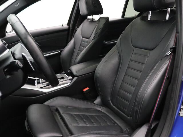 BMW 3-SERIE 184pk 320i High Executive Camera | Adapt. Cruise | Navi | Parkeersens. v+a | Stoel-/stuurverw. | Trekhaak