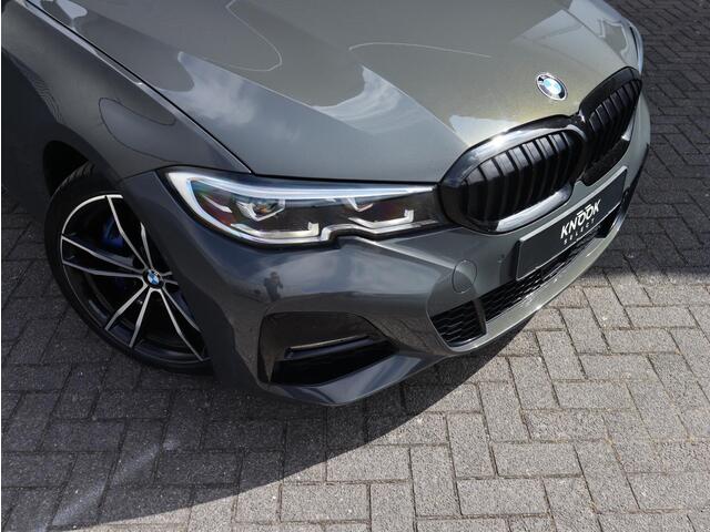 BMW 3-SERIE Touring 320i High Executive Edition | Head Up | Adaptief Cruise | Panodak |