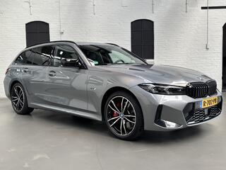 bmw-3-serie-touring-330e-xdrive-cam