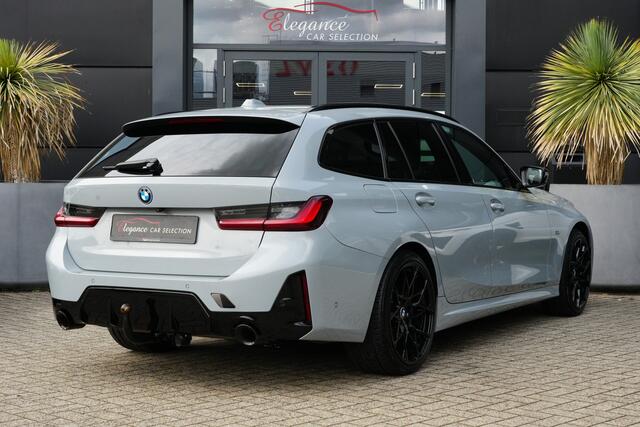 BMW 3-SERIE Touring 320e M-Sport 204pk Panoramadak/Stoelverwarming/Camera