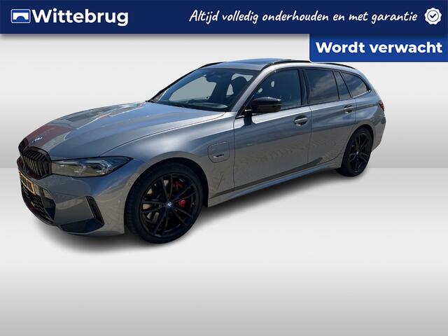BMW 3-SERIE Touring 330e xDrive / Pano / Head up / Harman kardon / Navigatie / Zwenkbare trekhaak / 360 Camera /
