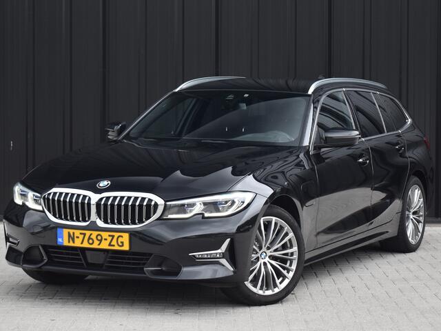 BMW 3-SERIE Touring 320e xDRIVE BUSINESS EDITION PLUS | LEDER | CARPLAY | TREKHAAK | CAMERA | LED | ADAPTIVE CRUISE CONTROL