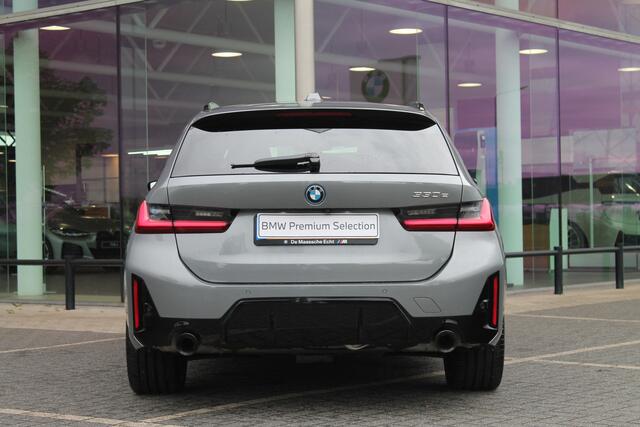 BMW 3-SERIE Touring 330e High Executive M Sport Automaat / Panoramadak / Trekhaak / Sportstoelen / Adaptieve LED / Comfort Access / Parking Assistant Plus / Stoelverwarming