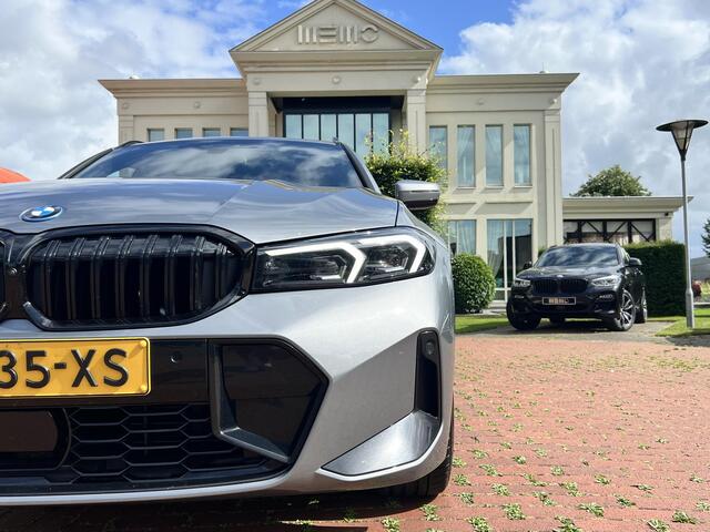 BMW 3-SERIE Touring 320e Carbon inleg - Harmen Kardon - Panoramadak - Trekhaak