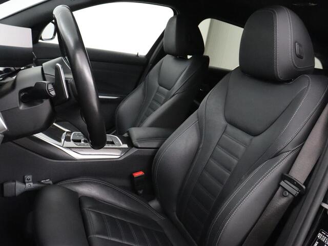 BMW 3-SERIE 320e M Sport | Head-Up | Adaptive cruise | Trekhaak | Leder | Stoelverwarming | Camera | Keyless | Adaptief LED | Carplay | Sfeerverlichting | Navigatie