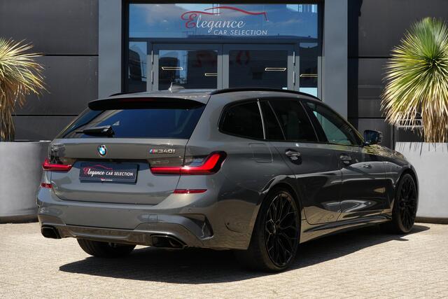 BMW 3-SERIE Touring M340i xDrive High Executive 374pk Panoramadak/Stoelverwarming/Camera