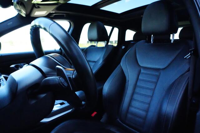 BMW 3-SERIE Touring M340i xDrive High Executive 374pk Panoramadak/Stoelverwarming/Camera