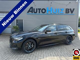 bmw-3-serie-touring-330e-xdrive-tre