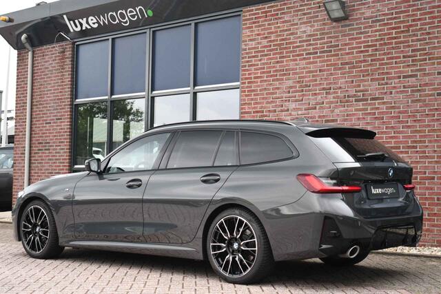 BMW 3-SERIE Touring 330e xDrive M-Sport Pro LCI Dravitgrau Pano HUD el-zetels 19inch