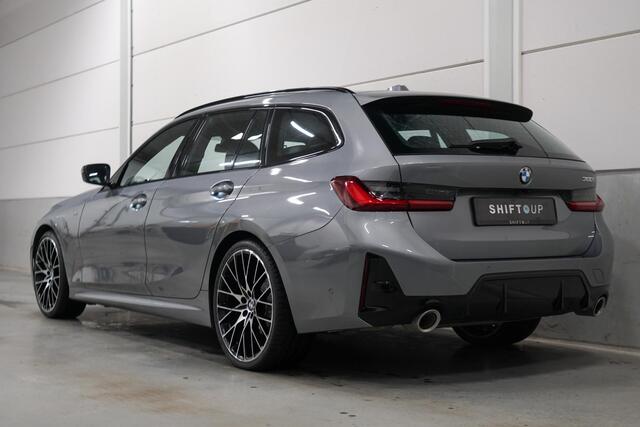 BMW 3-SERIE Touring 320i M-Sport | Hifi | 20" | Adapt. Cruise Control | Camera