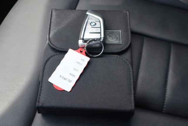 BMW 3-SERIE 320i High Executive Edition | HUD | Stoelverwarming | Automaat