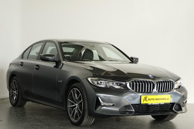 BMW 3-SERIE 320e High Executive / LED / Navi / CarPlay / Leder / DAB