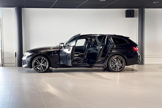 BMW 3-SERIE Touring 320e | M Sport | Glazen Panoramadak | Stoelverwarming | Comfort Access | HIFI |