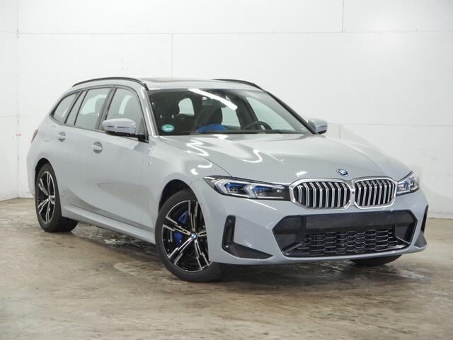 BMW 3-SERIE Touring 330e M-Sport | Panorama | Trekhaak | Elek. Verst.Stoelen | Stoel/Stuurverwarming | Harman Kardon