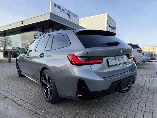 BMW 3-SERIE Touring 320e M sport Pano-Dak | Trekhaak | Adapt. Cruise | Stoelverw. |
