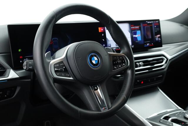 BMW 3-SERIE 320e M-sport | Shadow Line | Curved display | Cruise | Nav + CarPlay | Harman Kardon | LED | Stoel- stuurverw | PDC