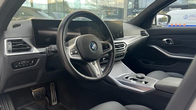 BMW 3-SERIE Touring 330e M-Sport | Navi | Camera | Stoel-Stuurverwarming