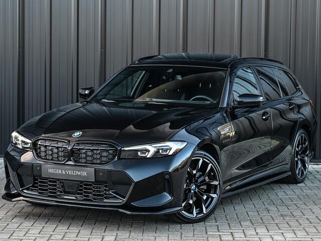 BMW 3-SERIE Touring 330e xDrive · M sport · Accu 19,5kWh · Trekhaak · Panoramadak · Active Cruise · Panorama dak · Camera · Ambiance interieur ·