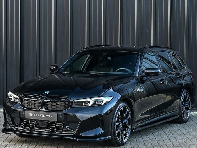 BMW 3-SERIE Touring 330e xDrive · M sport · Accu 19,5kWh · Trekhaak · Active Cruise · Camera · Ambiance interieur · Full Styling