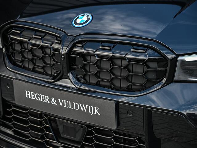 BMW 3-SERIE Touring 330e xDrive · M sport · Accu 19,5kWh · Trekhaak · Active Cruise · Camera · Ambiance interieur · Full Styling