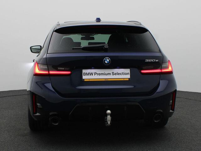 BMW 3-SERIE Touring 320e M Sportpakket Pro | Travel Pack | Innovation Pack | Comfort Pack | Entertainment Pack | Trekhaak | Comfort Access | Elektrisch Verstelbare Stoelen | Driving Assistant Professional | Harman Kardon | 19''
