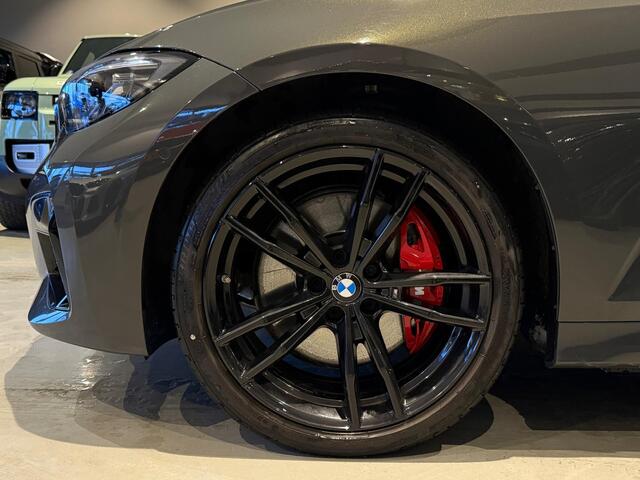BMW 3-SERIE Touring M340i xDrive Edition Plus Panodak Laser Trekhaak H/K Sound Carbon HUD 360Cam