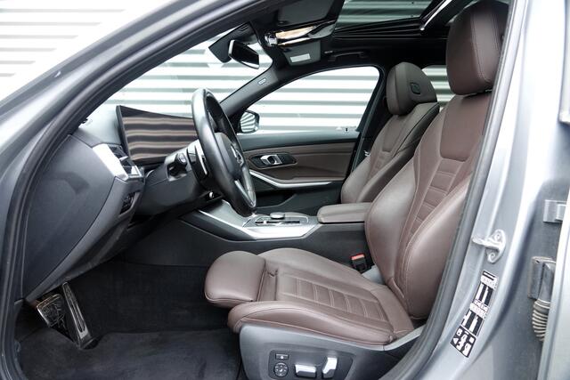 BMW 3-SERIE Touring M340d xDrive M-Sport | Pano | H&K | Memory | Trekhaak | 360 | HUD |