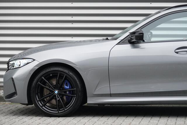 BMW 3-SERIE Touring M340d xDrive M-Sport | Pano | H&K | Memory | Trekhaak | 360 | HUD |