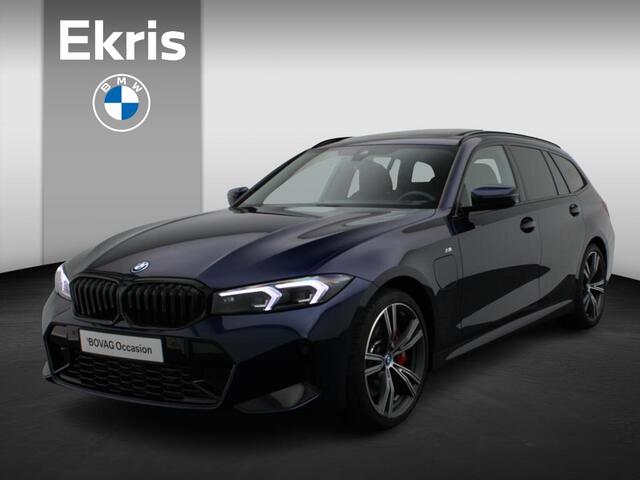 BMW 3-SERIE Touring 320e M Sportpakket Pro | Travel Pack | Innovation Pack | Comfort Pack | Trekhaak | Panoramadak | 19"