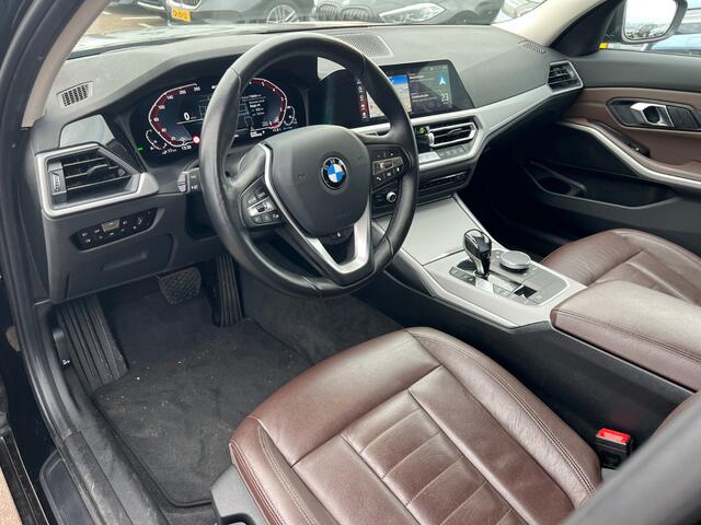 BMW 3-SERIE Touring 320e xDrive Business Edition Plus Sport | Panoramadak | Stuurverwarming | Stoelverwarming | Keyless | Laser Light | Head-Up Display | Apple Carplay | Navigatie |