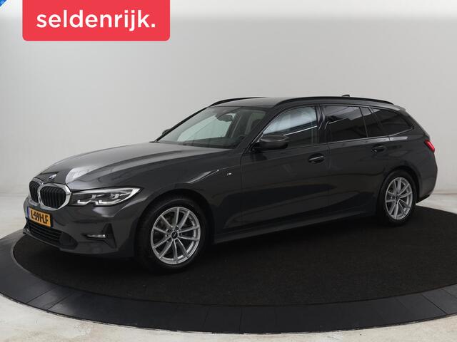BMW 3-SERIE 318i Business Edition | Trekhaak | Sportstoelen | Half leder | Adaptief LED | Carplay | Navigatie | Parkeerhulp | Climate control | Bluetooth | Cruise control