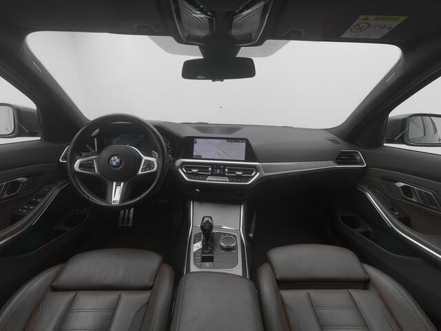 BMW 3-SERIE Touring 320e Business Edition Plus | CAMERA | BRUIN LEDER | STOEL- EN STUURVERW.