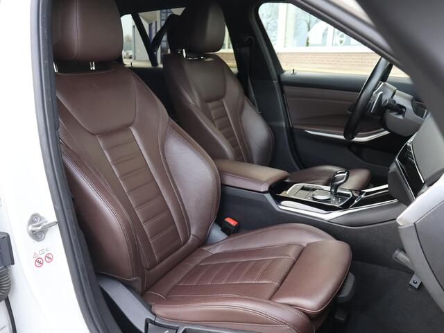 BMW 3-SERIE Touring 320d HIGH EXECUTIVE SPORTLINE 190 PK AUT. *ALPINWEISS* + ELEK. TREKHAAK | LASER LED | 18 INCH | STOEL/STUURWIELVERW.