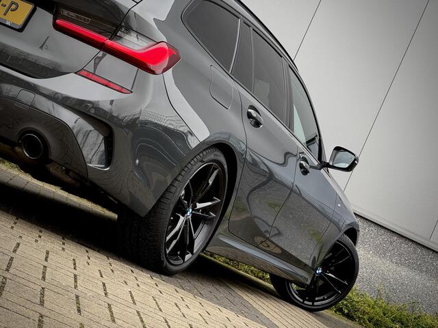 BMW 3-SERIE Touring 330i M-Sport Facelift 259pk Dravitgrau | Laserlicht | 360 Camera | Harman Kardon | CoPilot Adaptive Cruise | Keyless Entry | HUD | Dealer O.H.